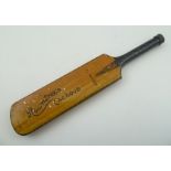 A "ROWNTREES" CACHOUS TIN, in the form of a cricket bat, having removable cap at the tip of the