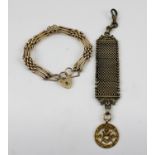 A 9CT GOLD GATE LINK BRACELET with padlock clasp, together with a 9ct gold Masonic fob, the fob is