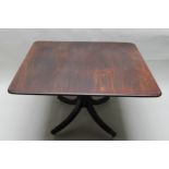 A 19TH CENTURY MAHOGANY SNAP-TOP BREAKFAST TABLE on turned stem with four outswept supports,