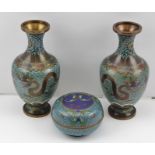 A PAIR OF TURQUOISE BLUE GROUND 20TH CENTURY CLOISONNE VASES, decorated with black five-toe dragons,