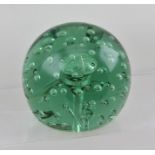 A VICTORIAN GREEN GLASS DUMPY WEIGHT, with bubble inclusions