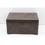 AN EARLY 19TH CENTURY MAHOGANY WORK BOX, fitted tray, on bun feet, 27cm wide