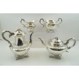 A MATCHED SILVER TEA AND COFFEE SET comprising; a Victorian teapot, milk jug and two-handled sugar