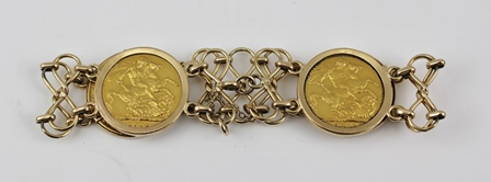 A GOLD BRACELET, set with four sovereigns, dated 1908, two dated 1911 and one dated 1918, the - Image 2 of 2