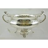 ATKIN BROTHERS A SILVER TWO-HANDLED PRESENTATION TROPHY BOWL with cast mask head and acanthus wing