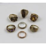 A COLLECTION OF SEVEN 9CT GOLD LADY'S DRESS RINGS, some stone set (7), combined weight 34g.