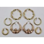 FOUR PAIRS OF YELLOW METAL HOOP EARRINGS, some marked 9ct., total weight 12g.