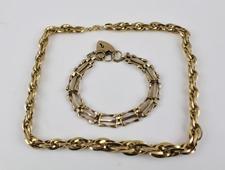 A 9CT GOLD GATE LINK BRACELET with padlock clasp, 11g., and a 14k fancy link NECKLACE, 9g. (2)