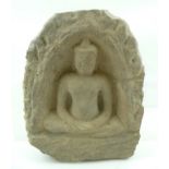 A CARVED STONE BLOCK 12TH CENTURY ANGKOR WAT, depicts a seated Buddha within a niche, block 28cm