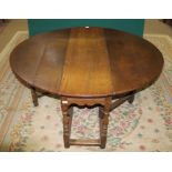 AN EARLY 18TH CENTURY OAK DROPLEAF DINING TABLE, fitted single end drawer, raised on turned baluster