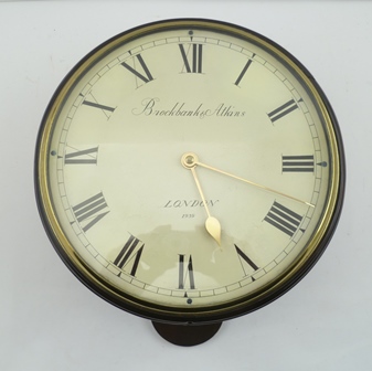 AN ENGLISH MAHOGANY CASED SINGLE FUSEE 10" WALL CLOCK, dial and back plate named "Brockbank &