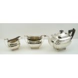 JAMES DEAKIN AND SONS (John and William F. Deakin) AN EDWARDIAN THREE PIECE SILVER TEASET of