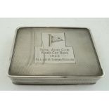 A SILVER BOX, presented at the Royal Aero Club Kings Cup Race, engine turned, gilded interior,