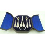 A VICTORIAN CASED PLATED SET OF GRAPE SCISSORS, NUT CRACKERS AND PICKS