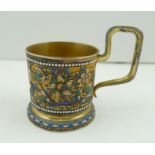 A RUSSIAN 84 ZOLOTNIK SILVER GILT CUP having floral cloisonne decoration, fitted high sitting