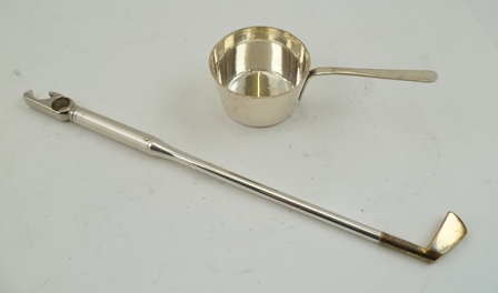 A SILVER PLATED COCKTAIL ACCESSORY in the form of Golf Club bottle opener, corkscrew and stirrer,