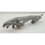 A CAST ALUMINIUM LEAPING JAGUAR CAR MASCOT, 19cm long