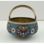 A LATE 19TH CENTURY RUSSIAN SILVER GILT SUGAR BOWL with hinged handle, floral cloisonne decoration,