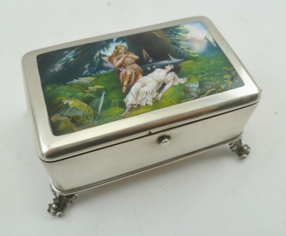 A GERMAN SILVER AND ENAMEL CASKET, the hinged cover inset Wagnerian enamel plaque, Brunhilde and