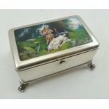 A GERMAN SILVER AND ENAMEL CASKET, the hinged cover inset Wagnerian enamel plaque, Brunhilde and