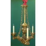 A REGENCY GILT BRONZE AND LACQUERED BRASS CEILING CHANDELIER, a central stem with fluted urn knop,