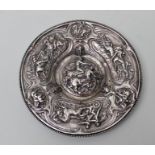 AN EARLY 20TH CENTURY SILVER PLATE CIRCULAR PLATTER in deep relief, decorated with various scenes of