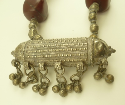 AN EASTERN, POSSIBLY BEDOUIN NECKLACE, set cube form dark red beads, possibly amber - Image 2 of 3