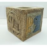 A "TROIKA" SLAB VASE of cube form, having textured stoneware with geometric designs in low relief,