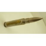 A WWI TRENCH ART PEN KNIFE, fashioned from a bullet, engraved with the legend 'Ypres', 7.5cm long