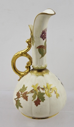 A ROYAL WORCESTER PORCELAIN SMALL CARAFE, having gilt rims, floral neck and belly, with gilt handle, - Image 2 of 3
