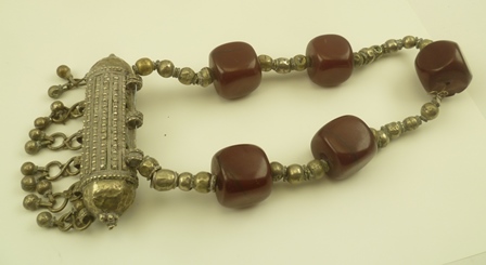 AN EASTERN, POSSIBLY BEDOUIN NECKLACE, set cube form dark red beads, possibly amber - Image 3 of 3