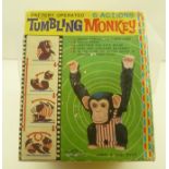 A JAPANESE BATTERY OPERATED TUMBLING MONKEY, no. 4912, six actions, in original vendor's box, height