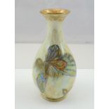 A WEDGWOOD LUSTRE VASE of tear drop form, mottled ground, painted and gilded with butterfly