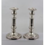 A PAIR OF SHEFFIELD PLATE TELESCOPIC CANDLESTICKS, circa 1830, with removable sconces, extended