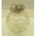 JAMES DEAKIN & SONS AN EDWARDIAN EMBOSSED SILVER TOPPED CUT GLASS SCENT BOTTLE of grenade form,