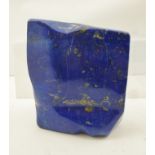A LARGE POLISHED BLOCK SPECIMEN OF LAPIS LAZULI, whose blue colour is pigment known as "