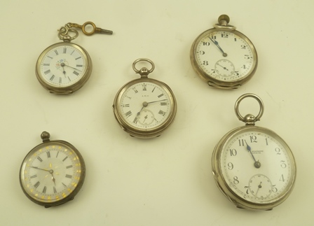 A COLLECTION OF FIVE WHITE METAL OPEN FACE POCKET WATCHES