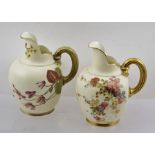 TWO ROYAL WORCESTER PORCELAIN VICTORIAN CARAFE JUGS, white glazed, each with polychrome decoration