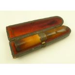 A LATE VICTORIAN MEERSCHAUM AND AMBER CHEROOT HOLDER, having silver band, Birmingham 1900, 8.5cm, in