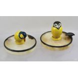 TWO ROYAL DOULTON CAKE MODELS, a penguin and an owl, each glazed in yellow, 45mm high and 32mm high,