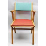 A 20TH CENTURY BEECH FRAME OPEN ARMCHAIR, having red upholstered seat with green upholstered back