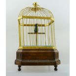 AN EARLY 20TH CENTURY FRENCH MUSICAL AUTOMATON BIRD CAGE, of decorative gilt metal construction,