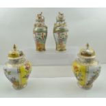 A PAIR OF DRESDEN PORCELAIN BALUSTER VASES, hand-painted with alternate panels of flowers and
