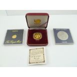 A GOLD PROOF COIN to commemorate the Seoul 1988 Olympics, cased with certificate, together with a