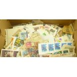 A BOX OF APPROXIMATELY ONE KILO OF KILOWARE (stamps on pieces), many hundreds of stamps