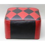 A 20TH CENTURY REXINE FOOTSTOOL, red and black diamond top upholstery, 45cm x 46cm x 26cm high