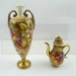 A ROYAL WORCESTER BONE CHINA VASE of slender form fitted two shoulder handles, hand painted fruit