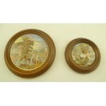 TWO PRATTWARE POT LIDS, one titled "Fording the Stream", no.335, both in stained wood frame