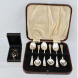 WILLIAM SUCKLING LTD. A SET OF SIX SILVER COFFEE SPOONS, having drawn handles and canted