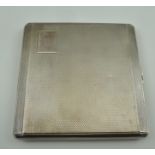 JOHN HENRY WYNN AN EARLY 20TH CENTURY SILVER CIGARETTE CASE, having engine turned decoration,